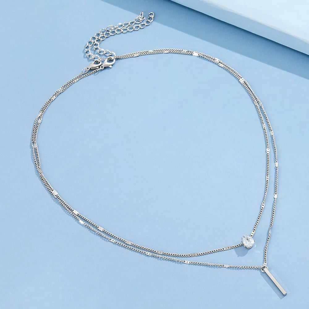 Colar Feminino de Zircônia – Multicamadas e Choker com Pingente Brilhante